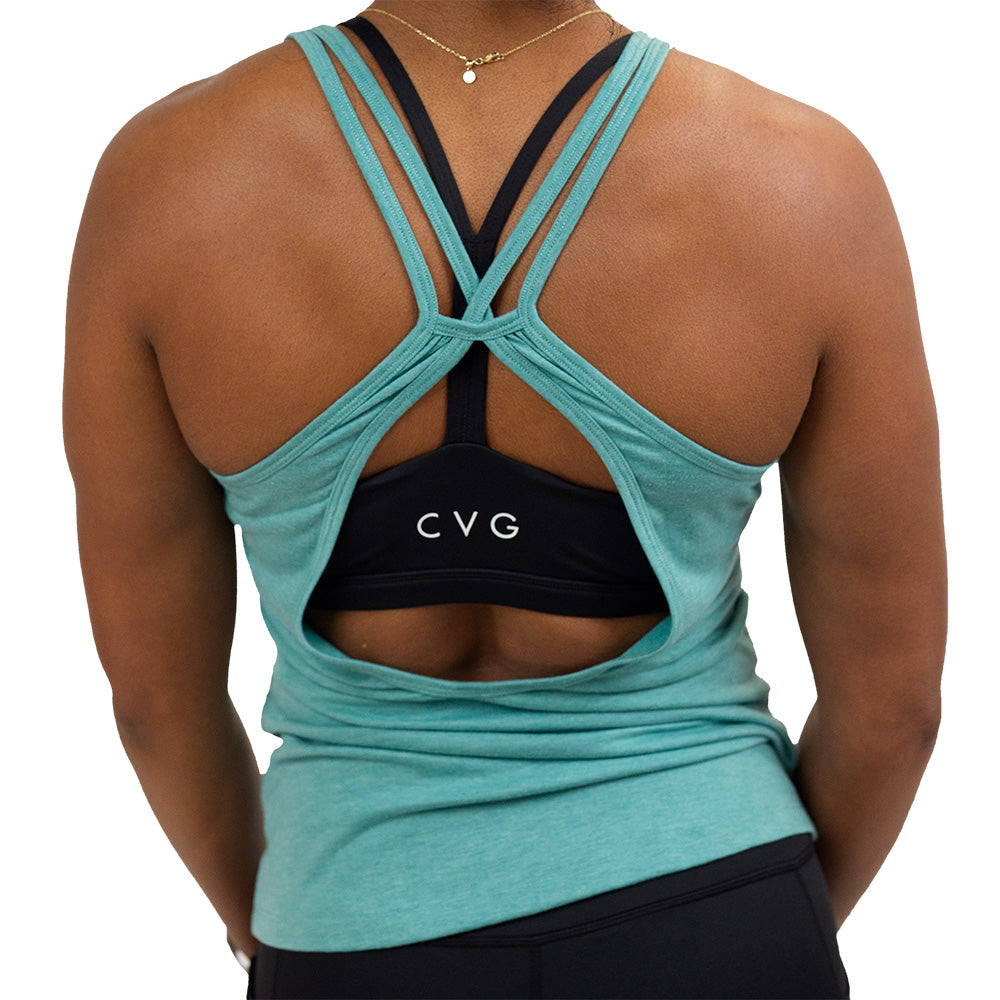 back of the teal open back tank top against a white background