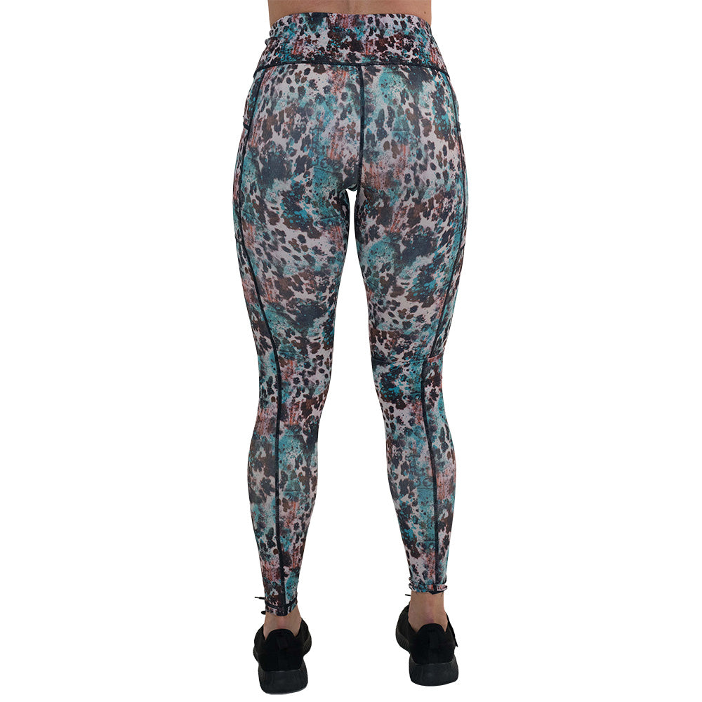 back of the leopard print with teal paint splatter leggings