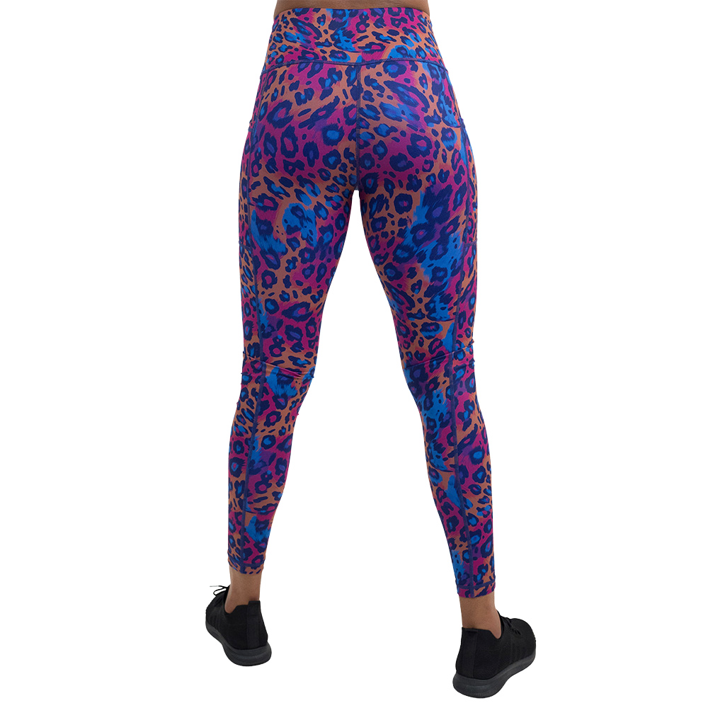 back of the cheetah print against a yellow, blue, and purple background pattern leggings