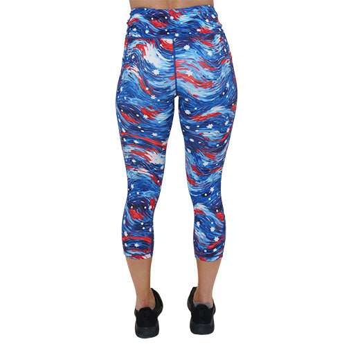 back of the capri length red, white and blue paint patterned leggings