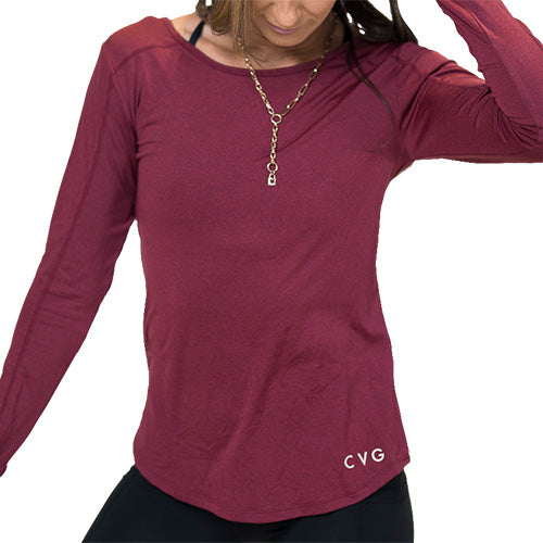 model wearing a maroon long sleeve shirt