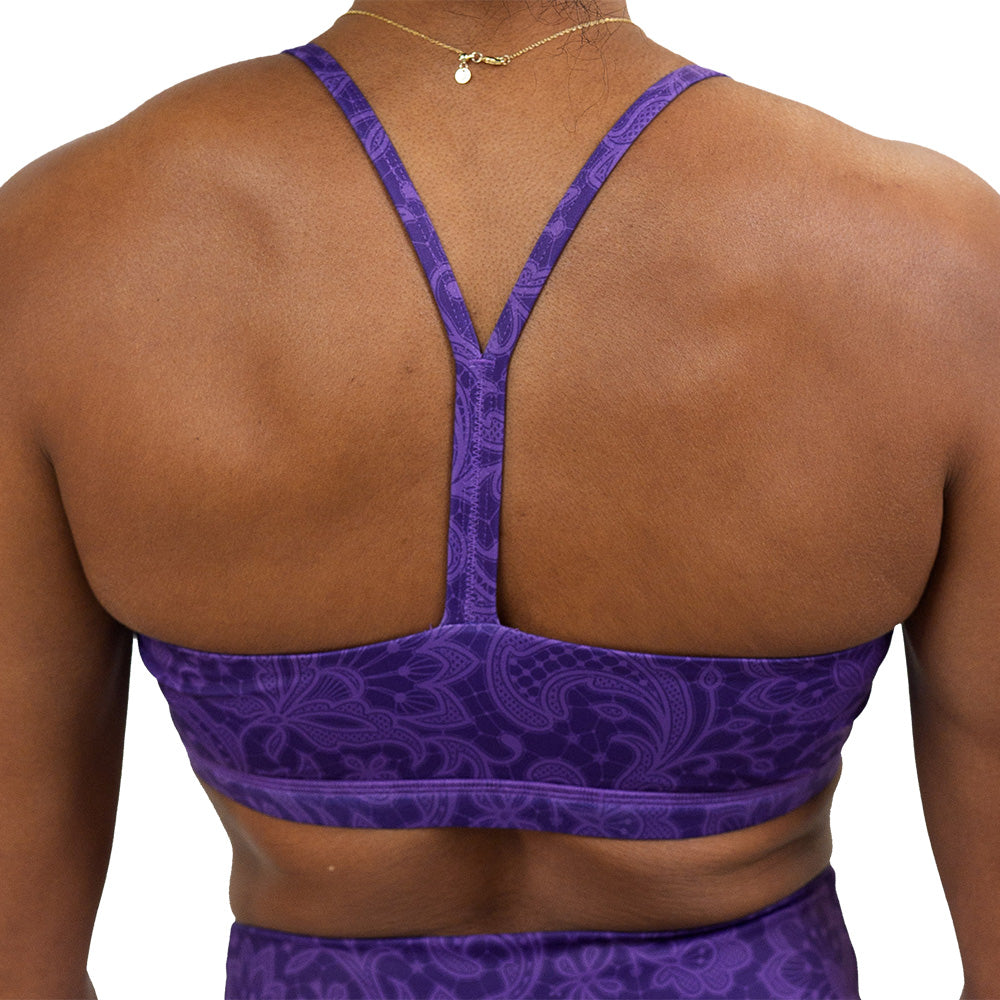 back of the purple flower artwork move free bra against a white background