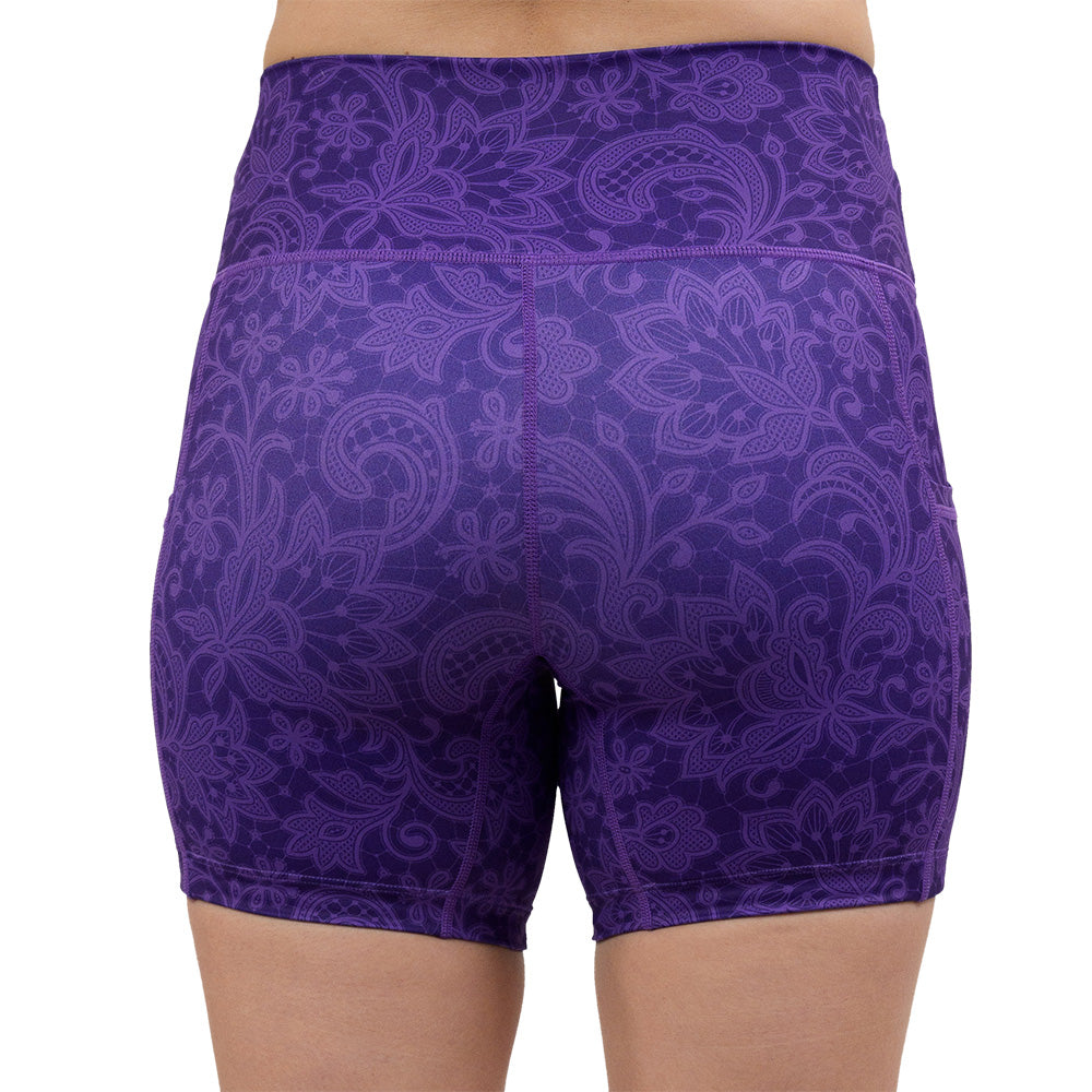 back of the purple flower artwork 5 inch shorts against a white background