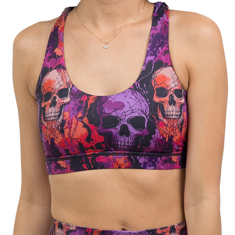 purple and orange skull patterned bra