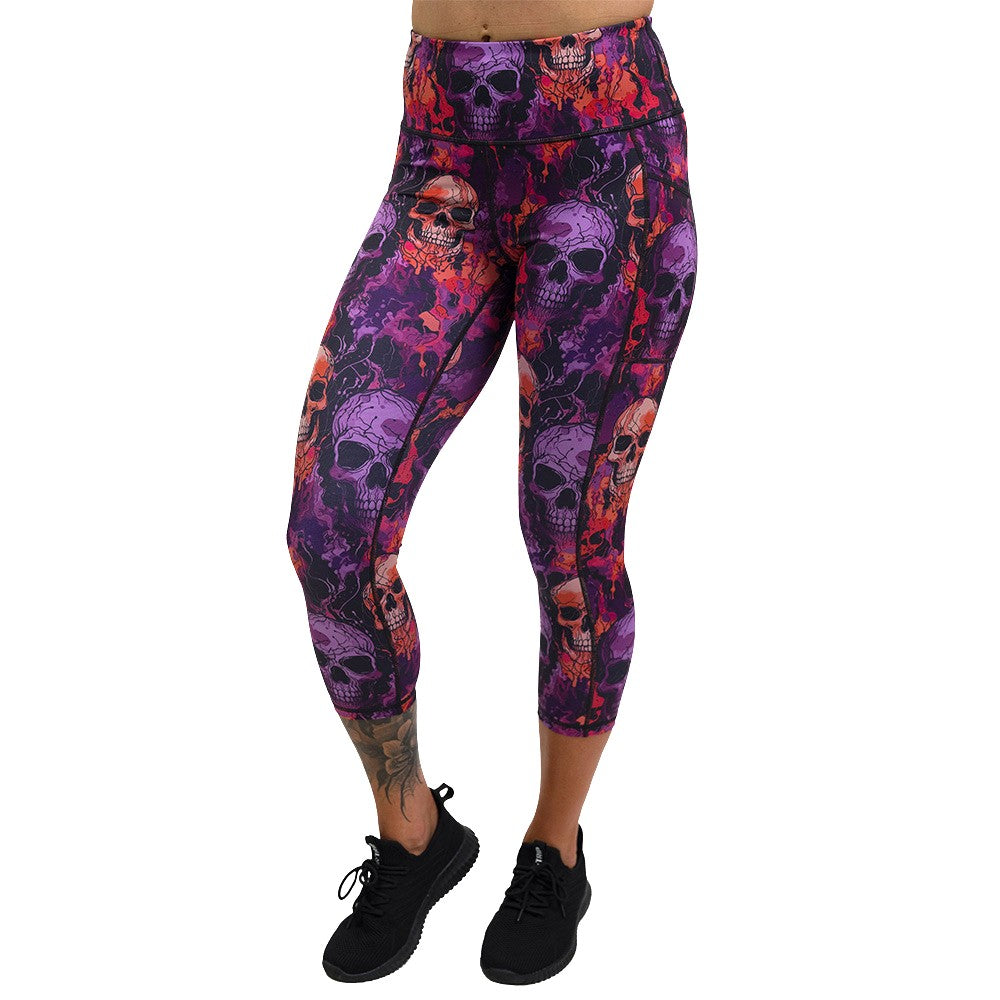 purple and orange skull patterned leggings