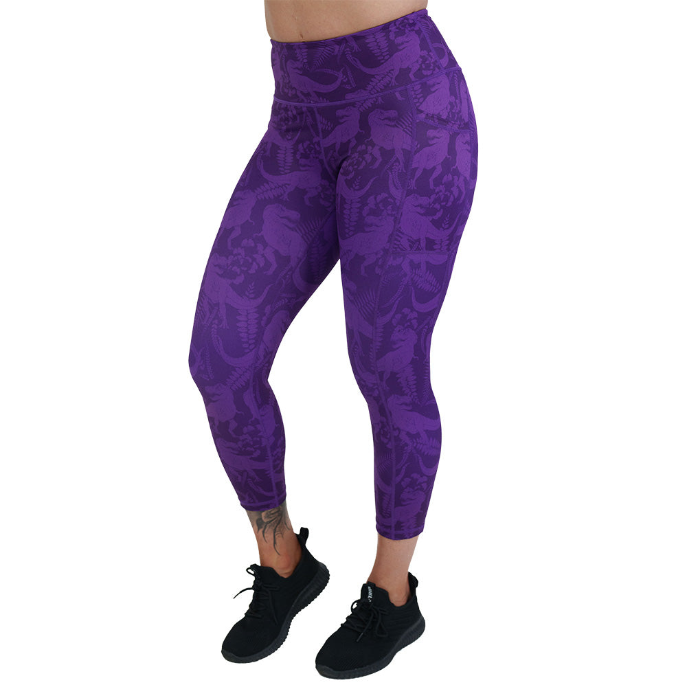 purple dinosaur patterned leggings