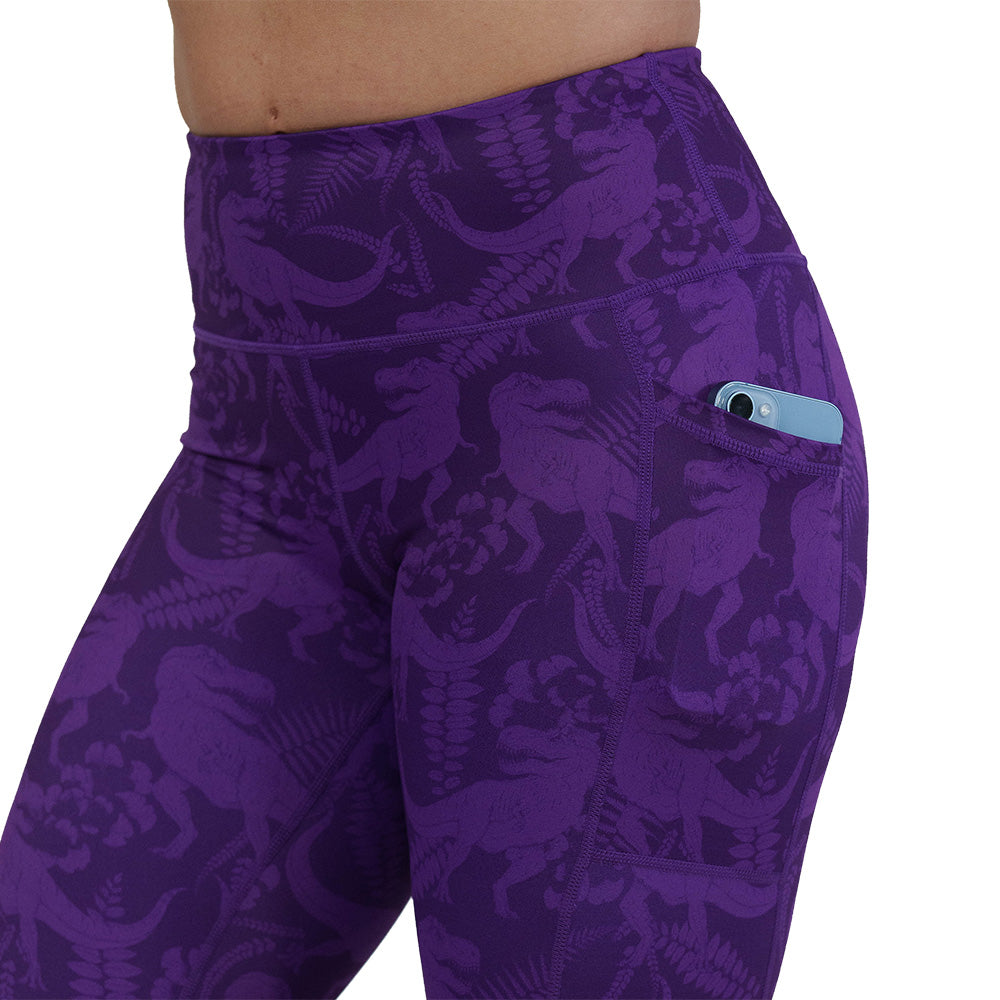 purple dinosaur patterned leggings