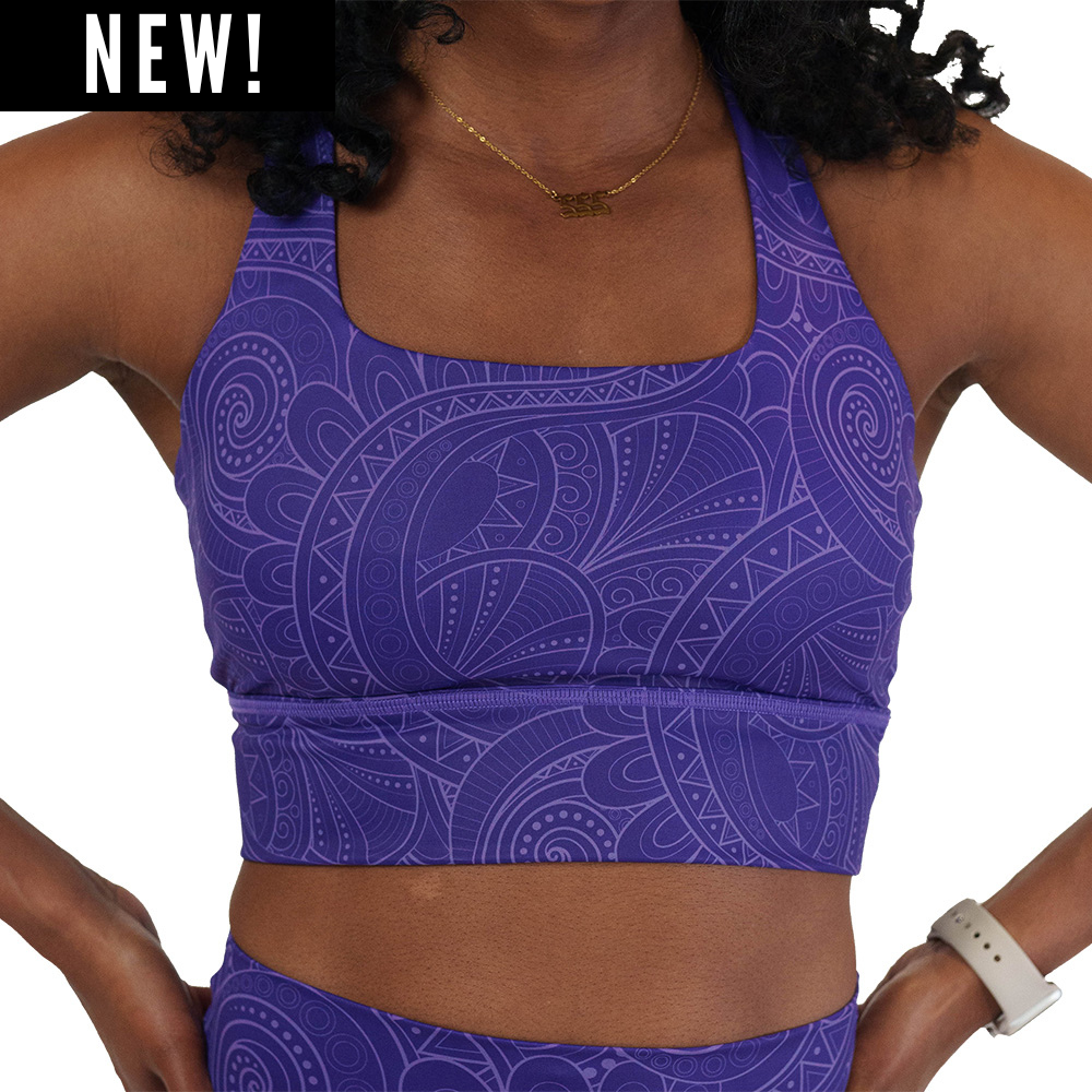 purple sports bra with a spiral design