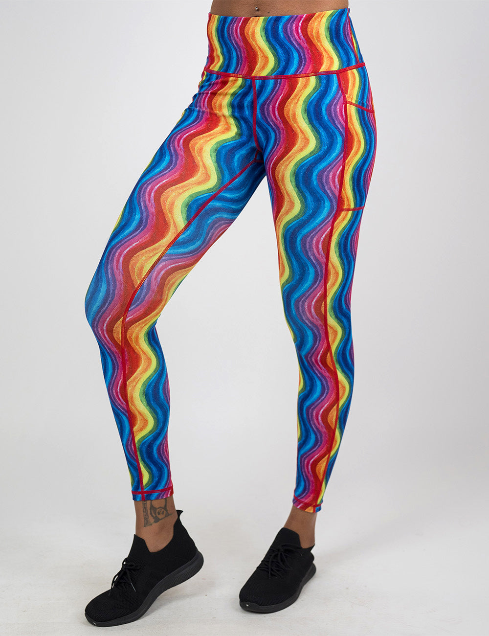 rainbow waves full length leggings facing the front against a white background