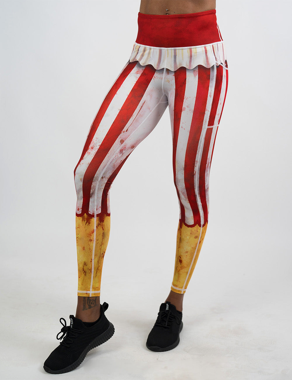 front of the bloody red and white stripes circus full length leggings against a white background