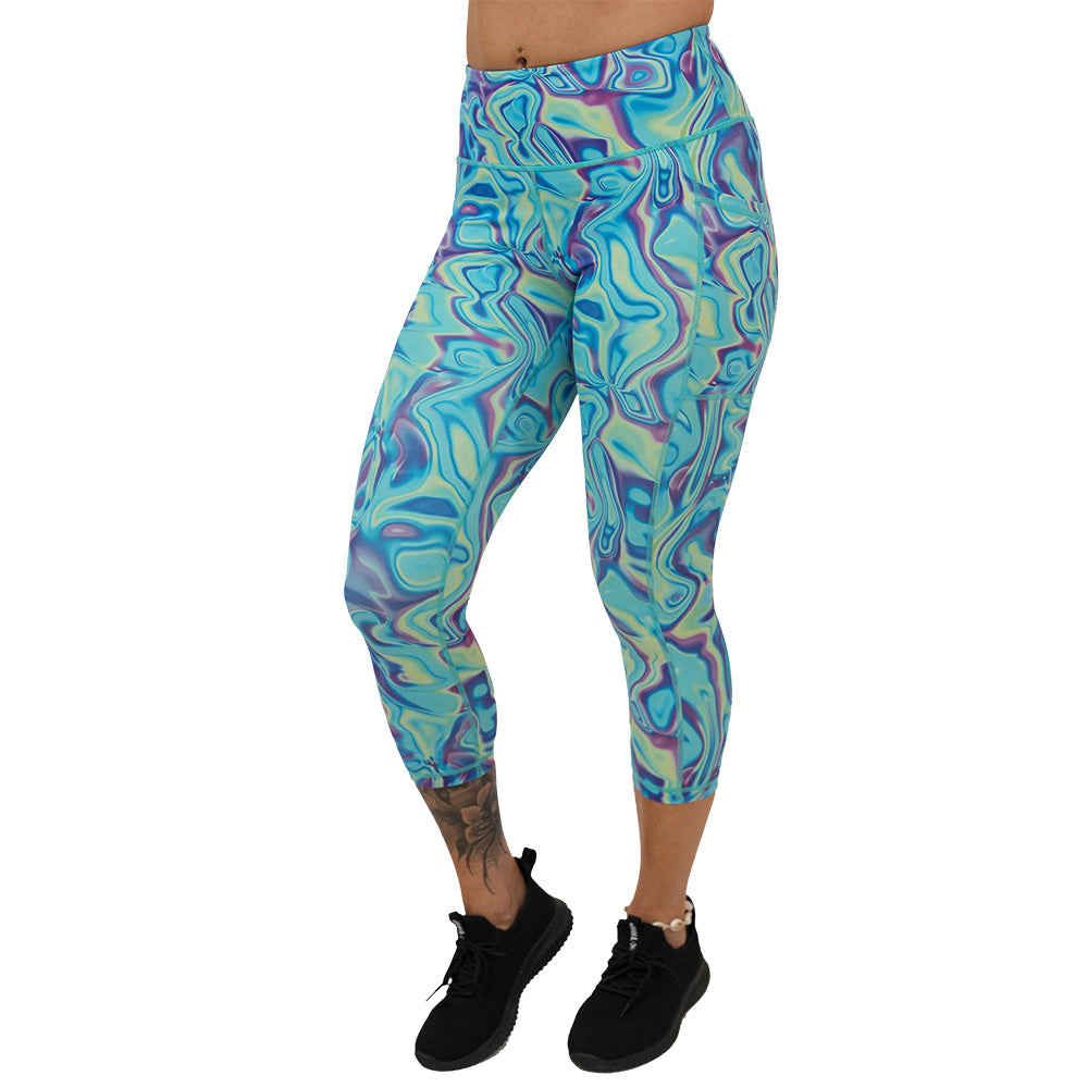 Multicolored swirl patterned leggings on a white background