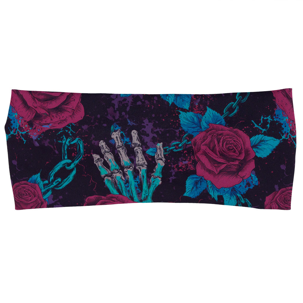 front of the roses and skeleton hands connected by chain links pattern headband against a white background