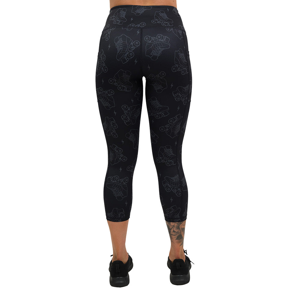 back of dark roller skates and lighting print leggings capri leggings