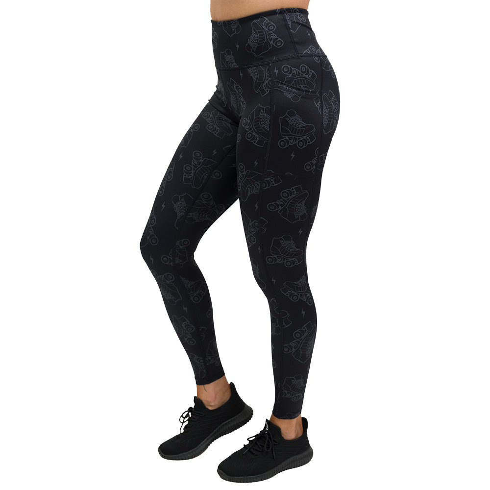 dark roller skates and lighting print leggings length leggings facing the side