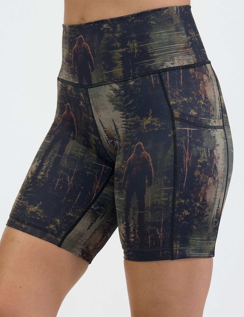 front of the 7 inch bigfoot in a forest shorts against a white background