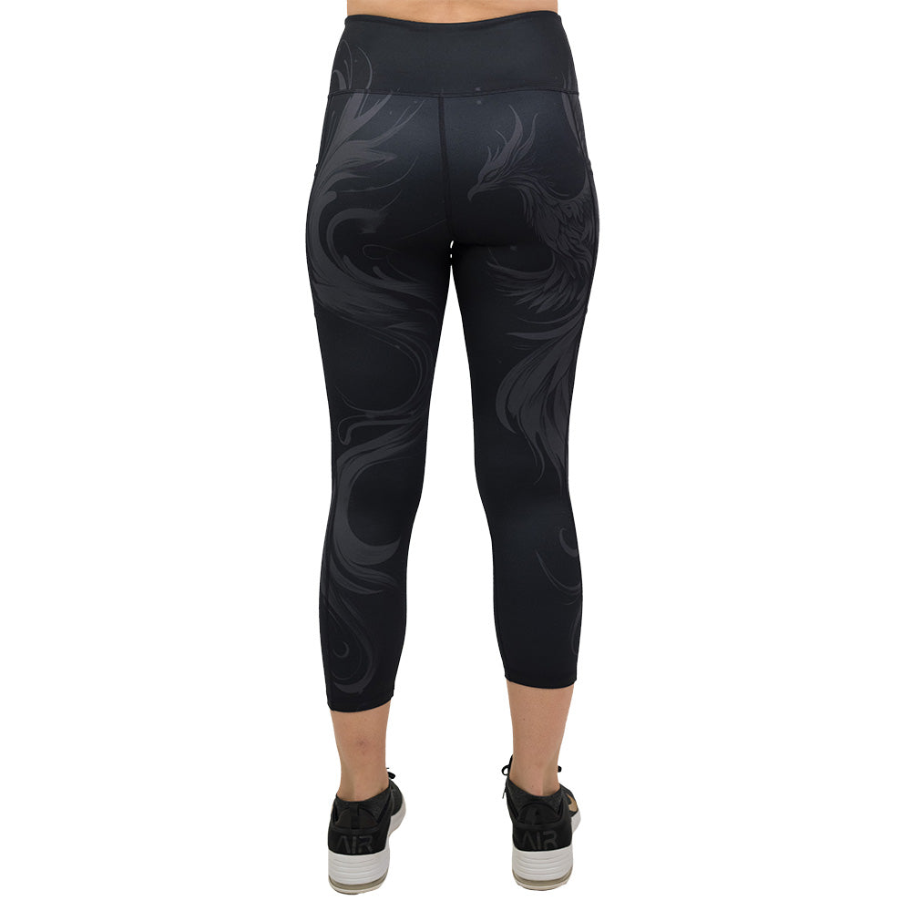 back of the Black leggings with a phoenix design on them
