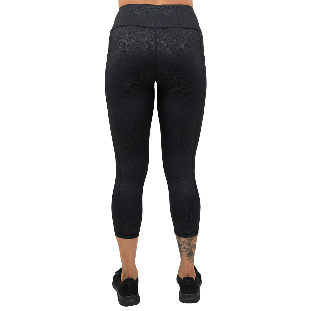 back of the black snake print capri leggings