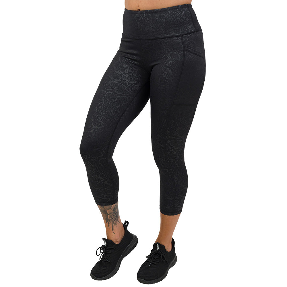 black snake print capri leggings facing the front
