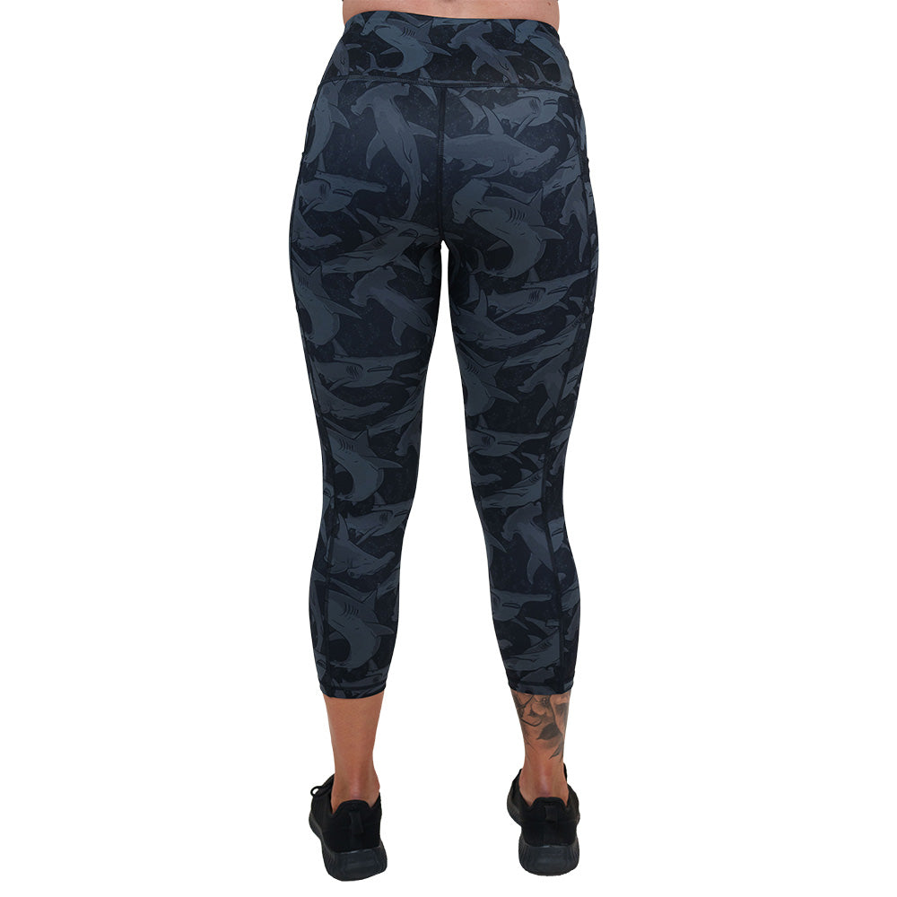 back of the black and grey shark patterned leggings