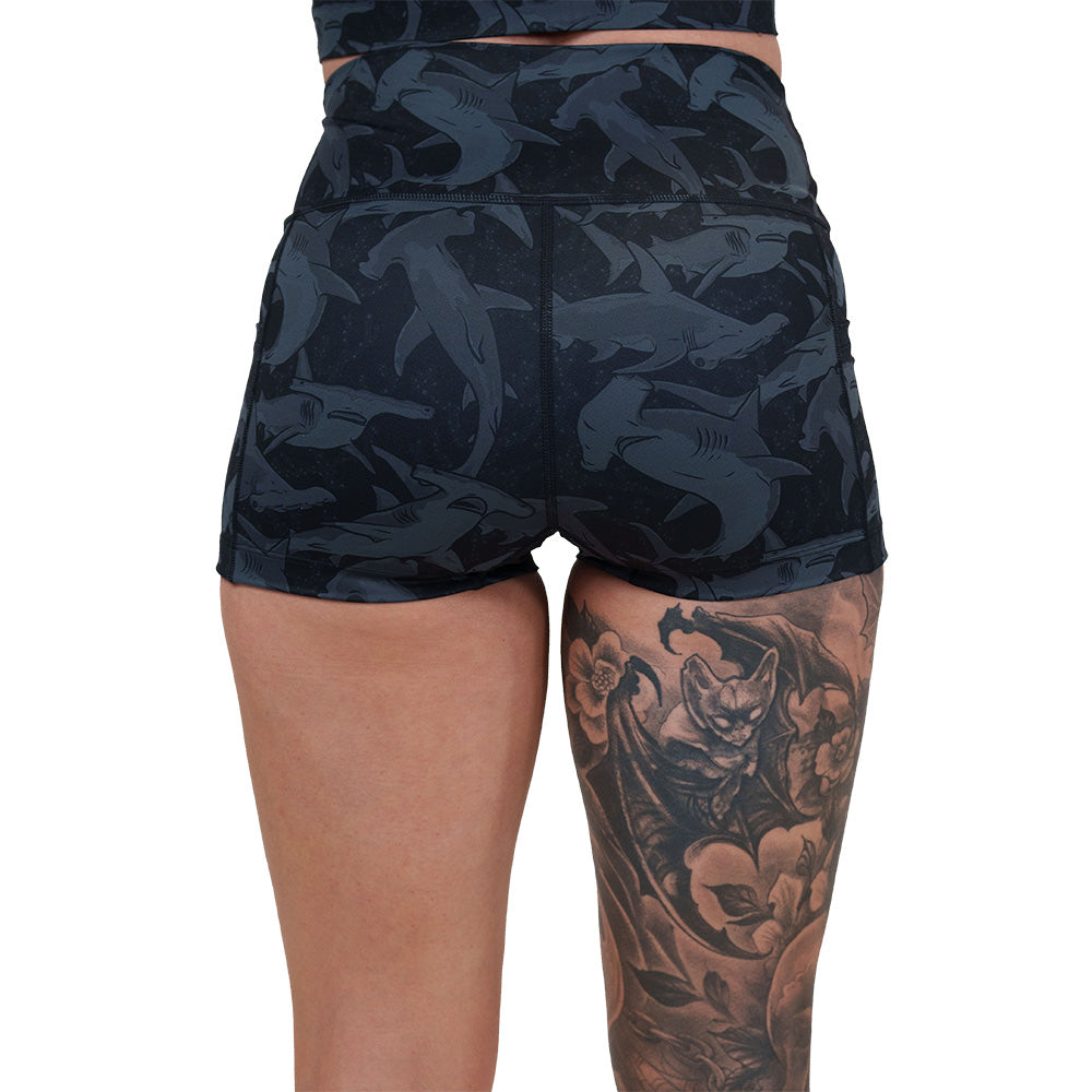 back of the black and grey shark patterned shorts