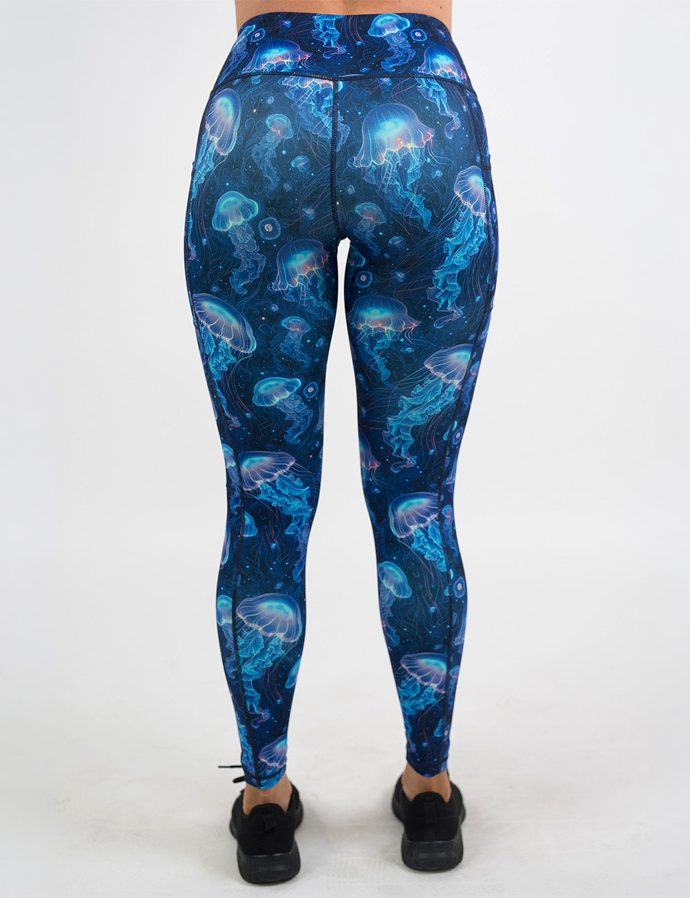 back of the full length blue jelly fish pattern leggings against a white background