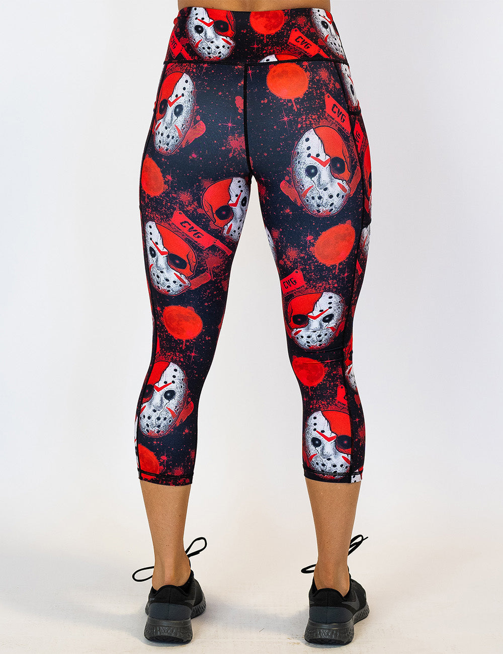 back of the bloody hocky mask capri leggings against a white background