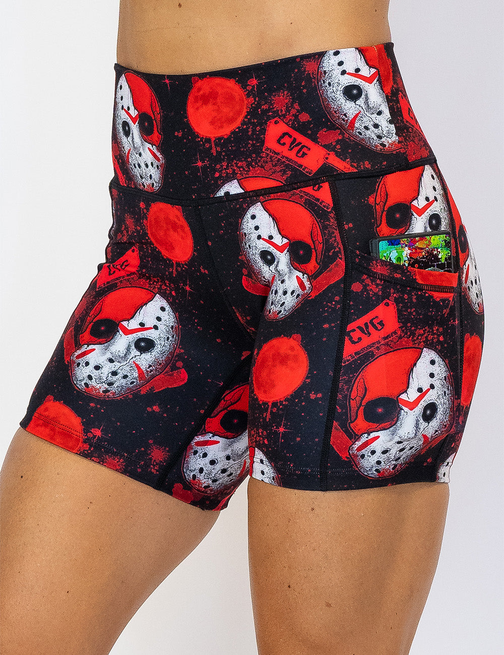 close up of the bloody hockey masks with CVG meat cleavers 5 inch shorts with a phone in its pocket