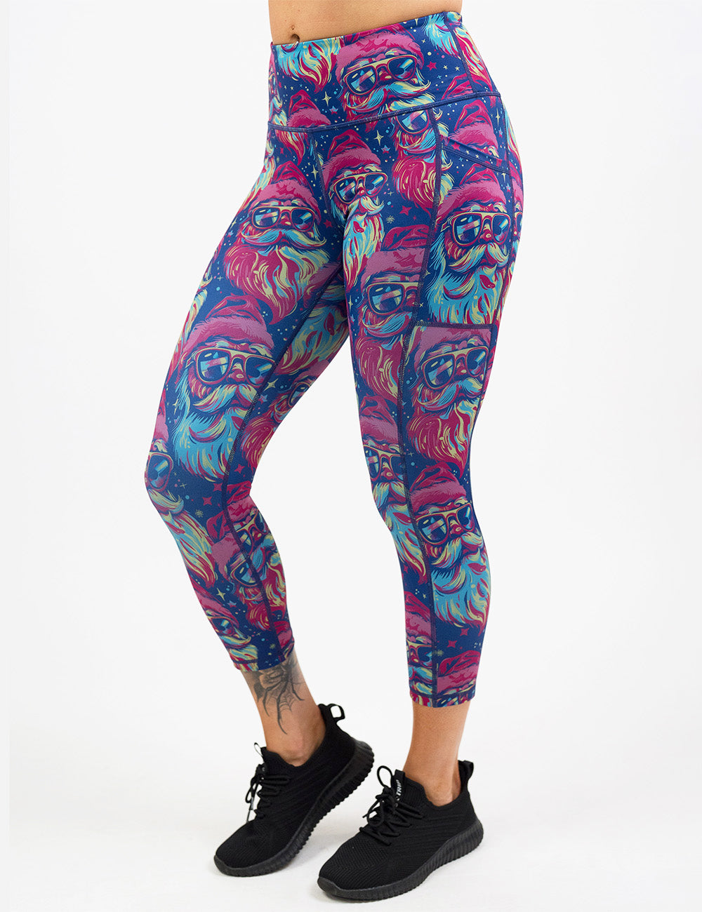 front of the colorful Santa-in-sunglasses capri leggings against a white background