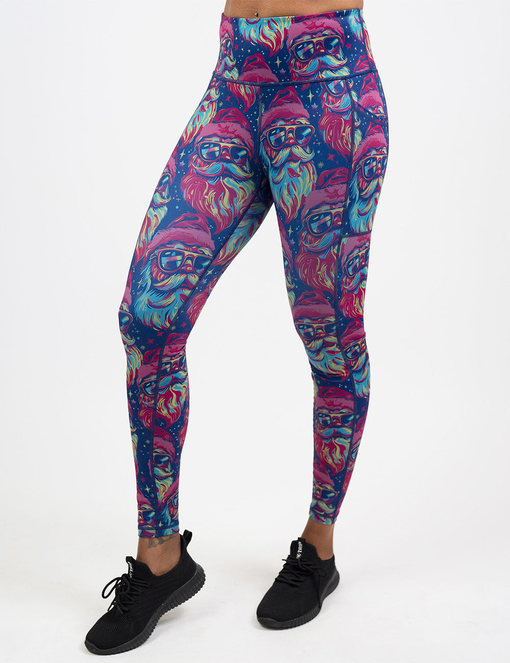 front of the colorful Santa-in-sunglasses full length leggings against a white background