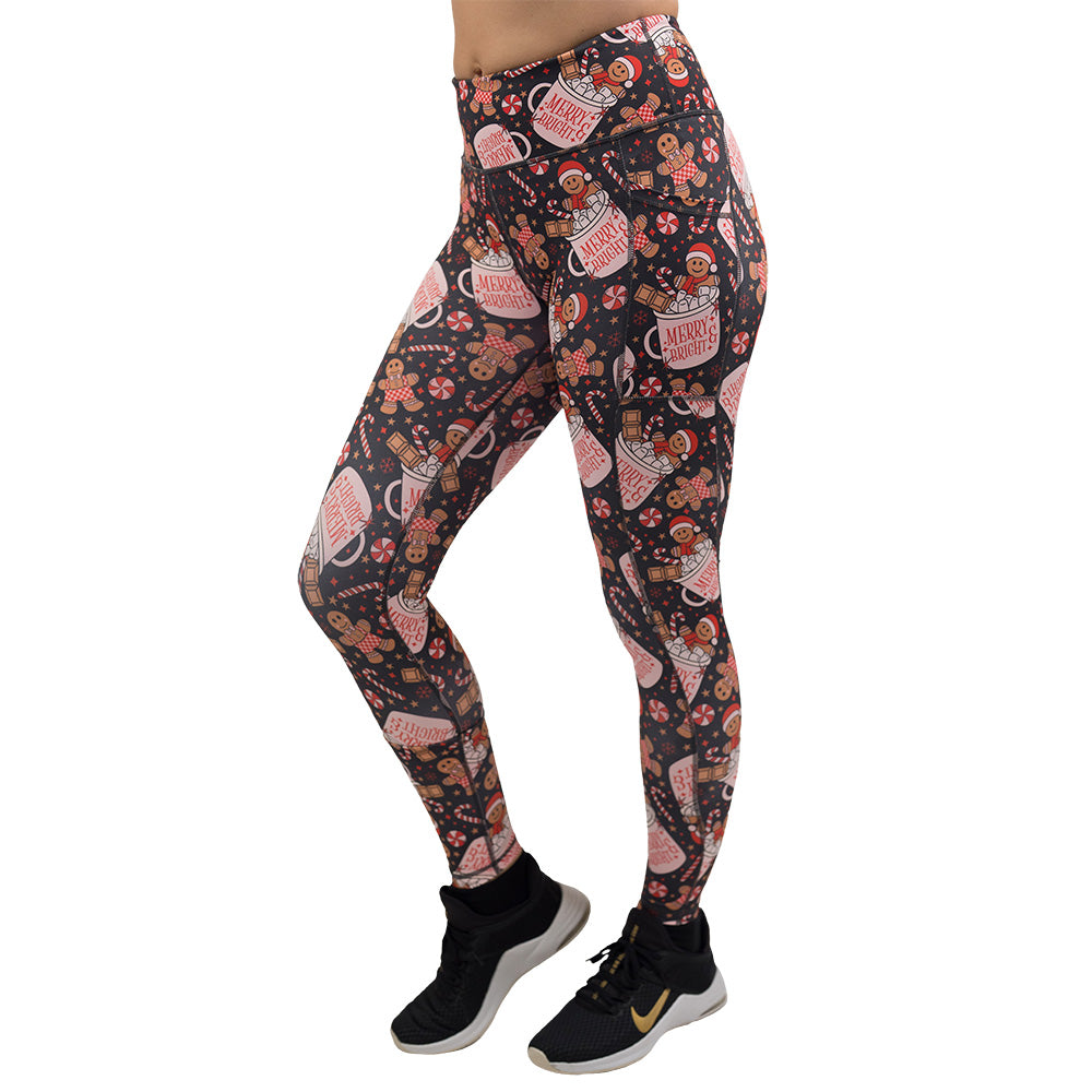Christmas-themed leggings with gingerbread men and candy canes