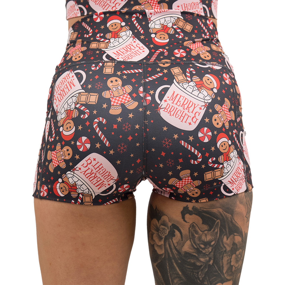 back of the Christmas-themed shorts with gingerbread men and candy canes