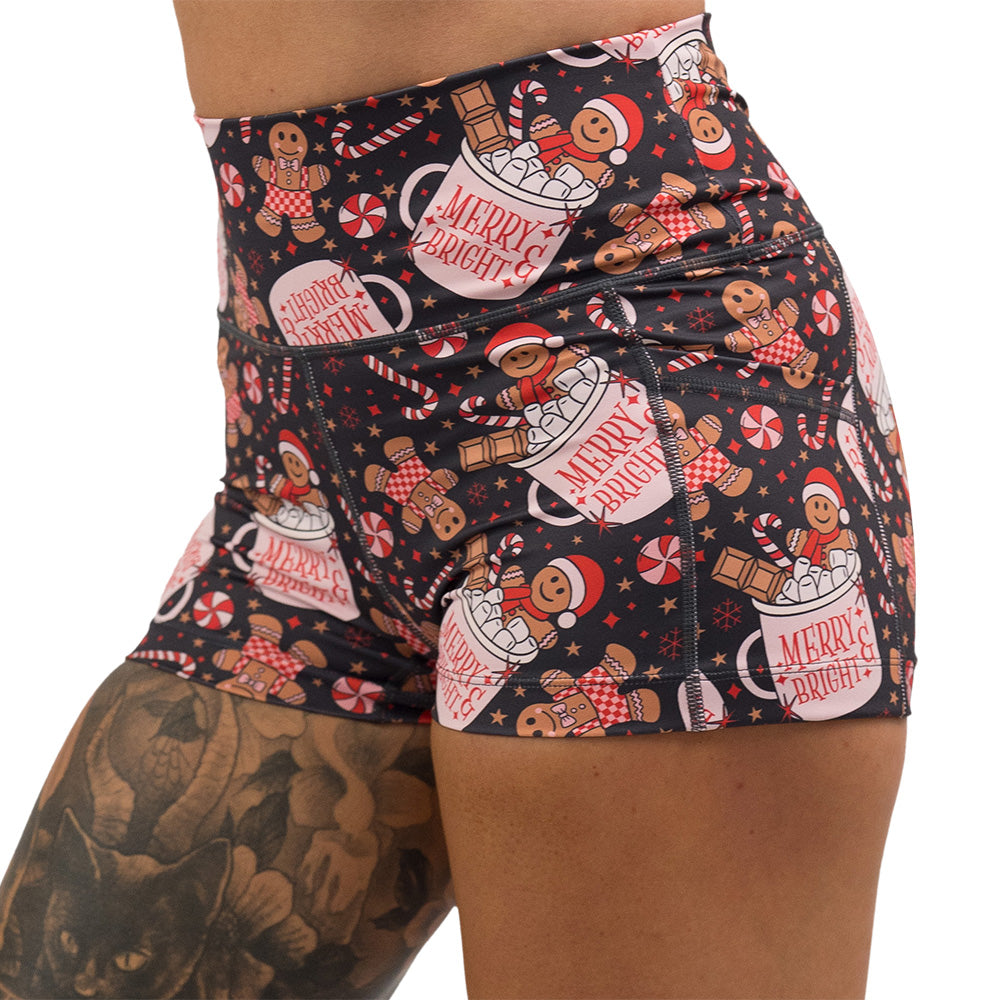 Christmas-themed shorts with gingerbread men and candy canes