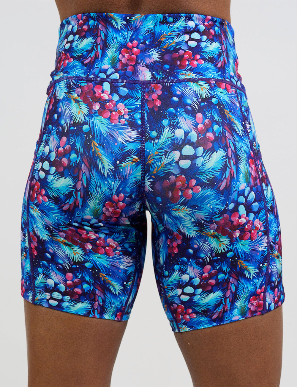 back of the 7 inch winter berries among blue leaves shorts against a white background