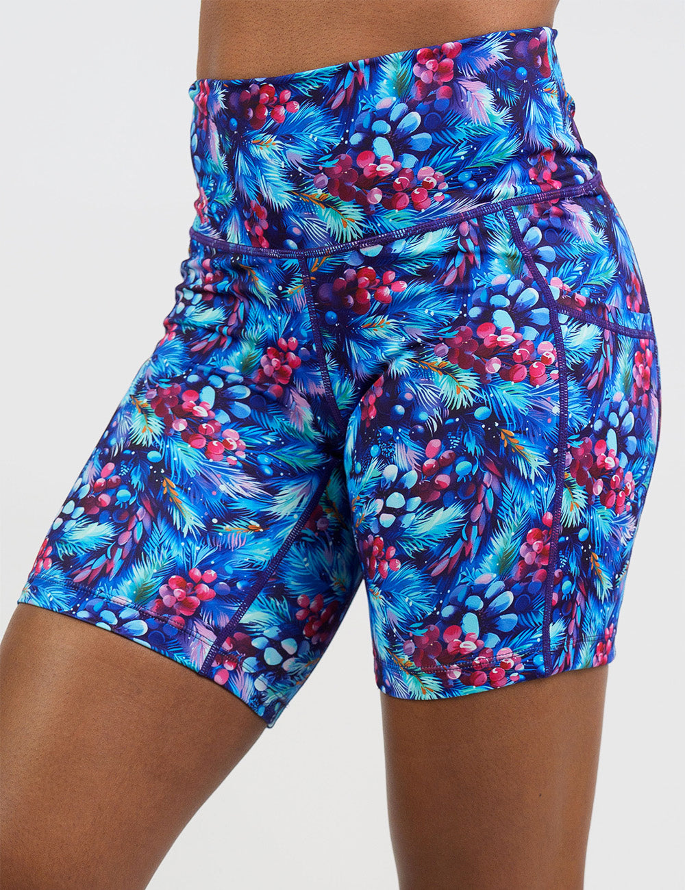 front of the 7 inch winter berries among blue leaves shorts against a white background