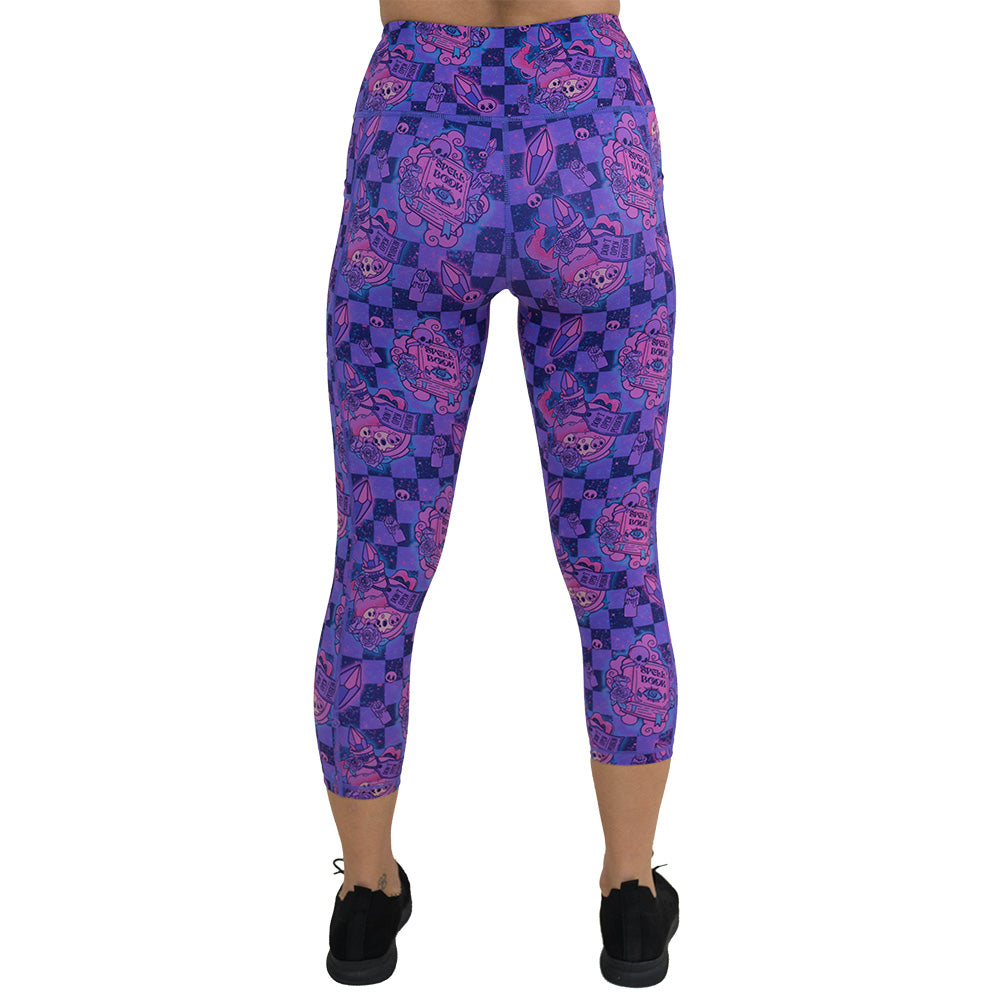 back of the capri length spellbook patterned leggings