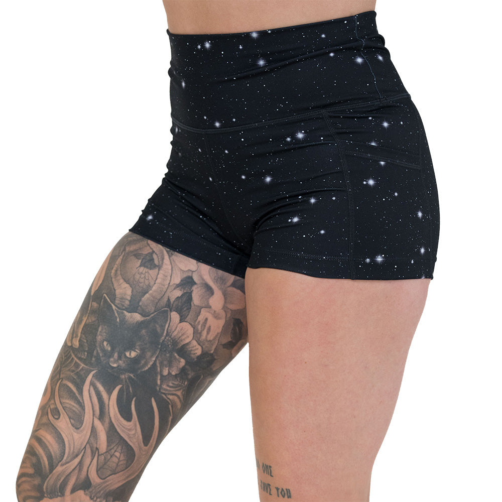 black shorts with a white star pattern on it
