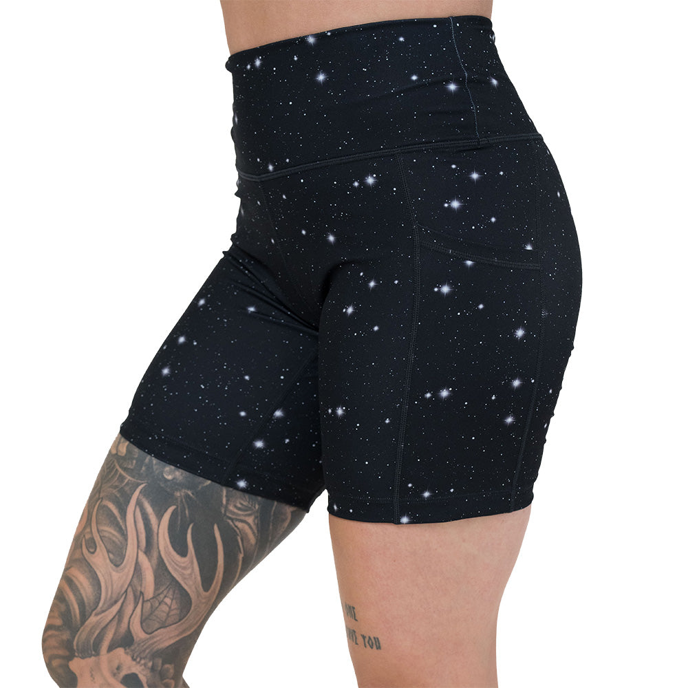 black shorts with a white star pattern on it