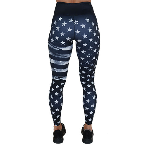 back of the full length black leggings with white American flag design on it