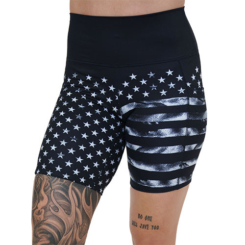 7 inch black shorts with white American flag design on it