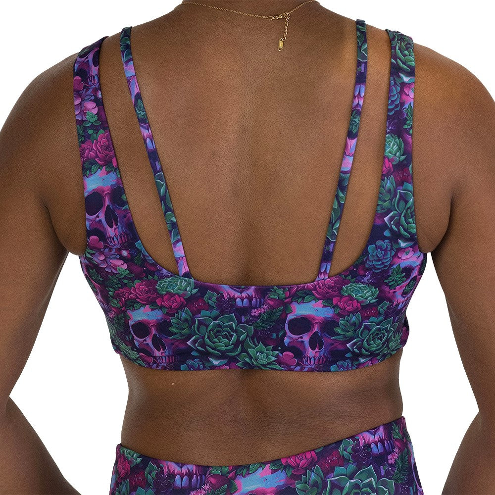 back of the Floral and skull patterned sports bra
