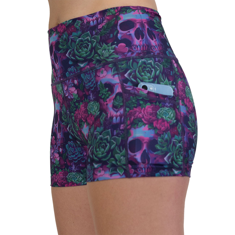 pocket on the Floral and skull patterned shorts