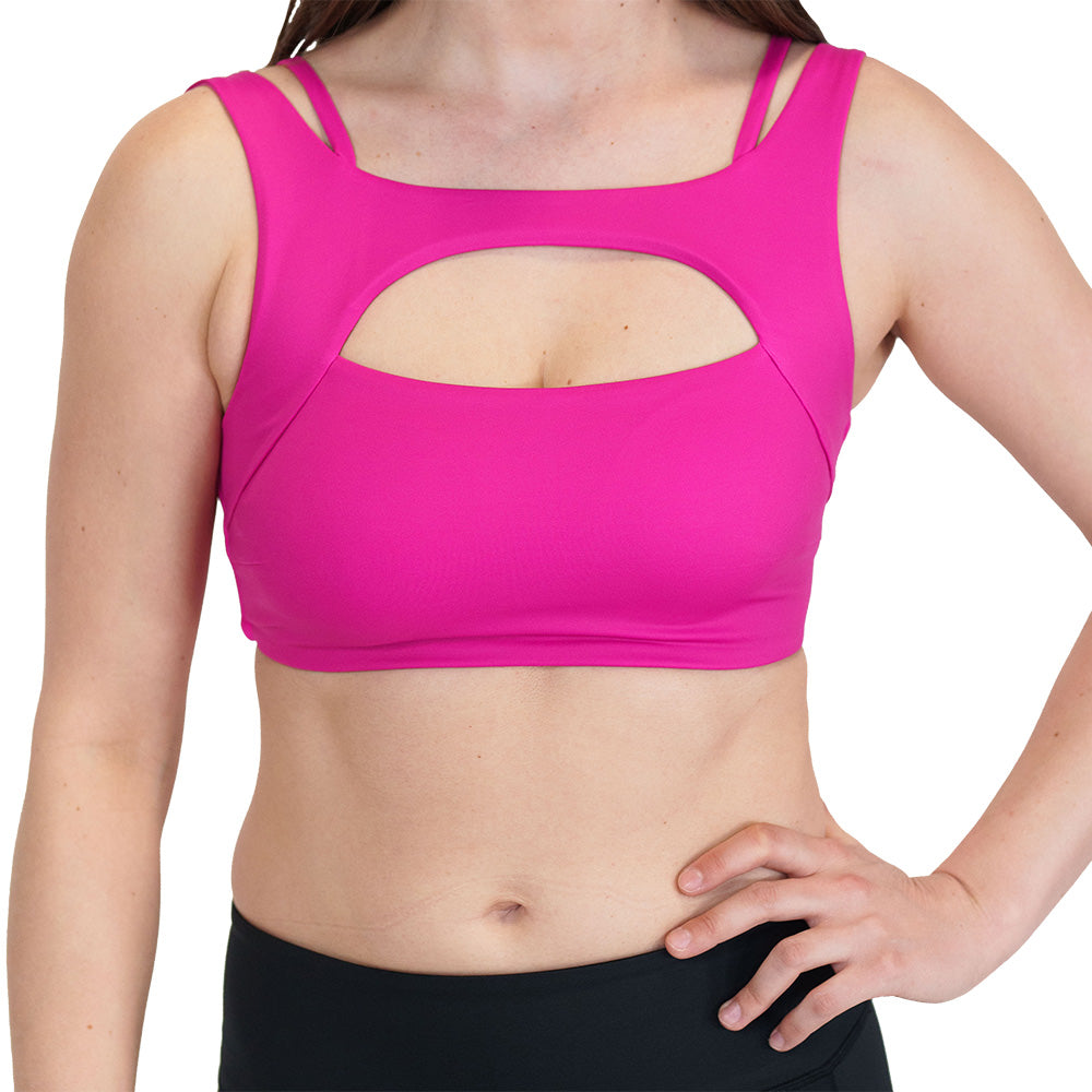 model wearing a hot pink sports bra