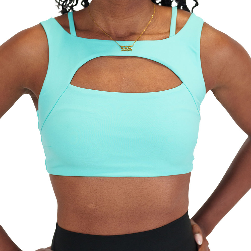 model wearing a Turquoise sports bra