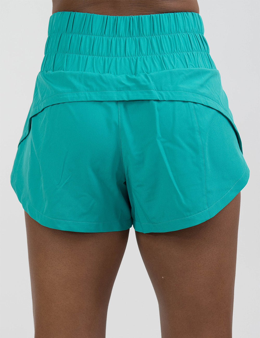 back of the 3.5 inch teal day dream shorts against a white background