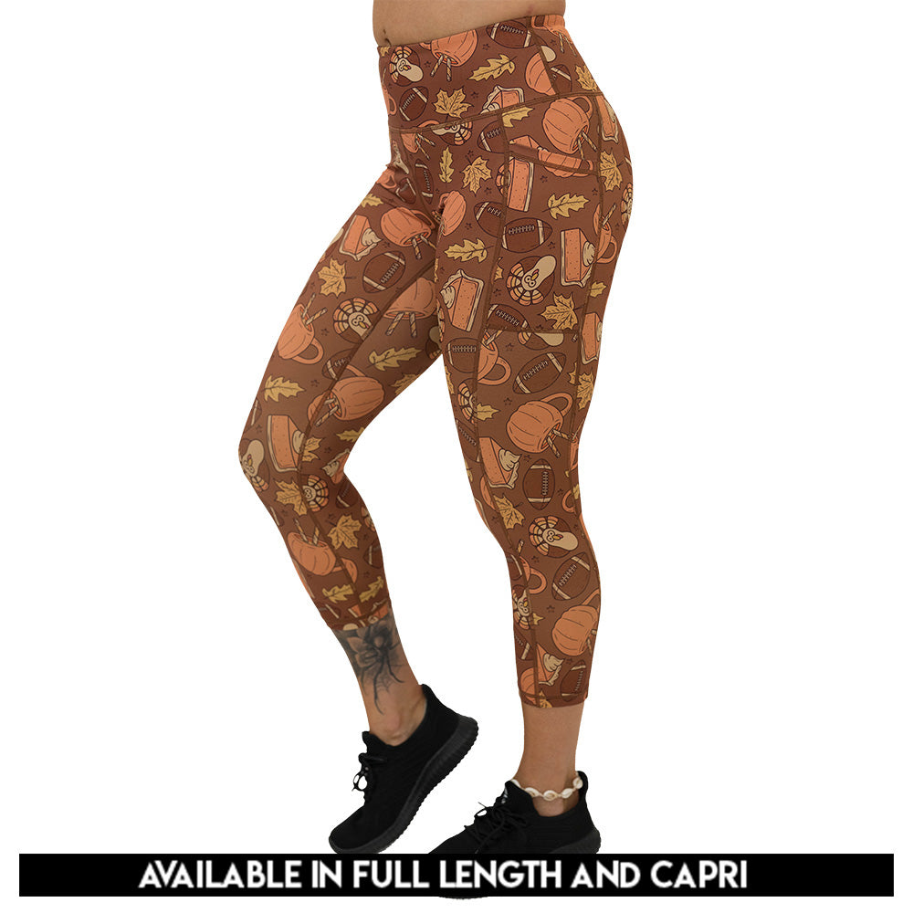leggings with pumpkins, leaves, and football