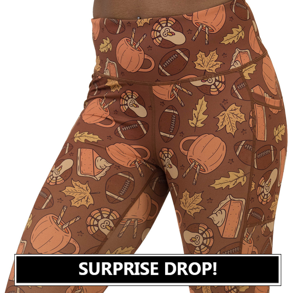 leggings with pumpkins, leaves, and football