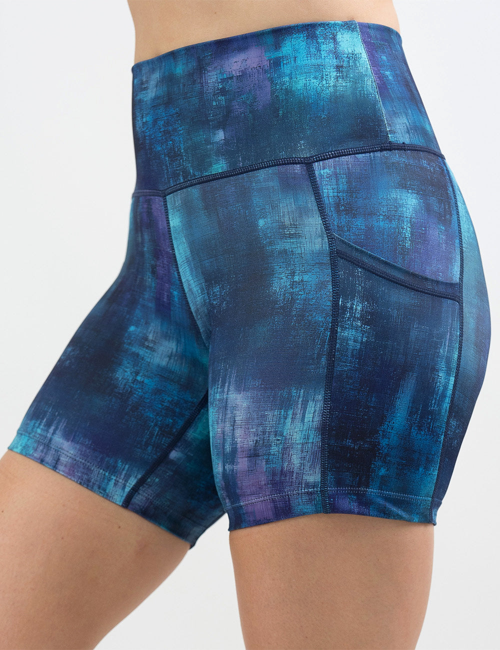 front of the 5 inch blue, teal, and purple grunge concrete pattern shorts against a white background