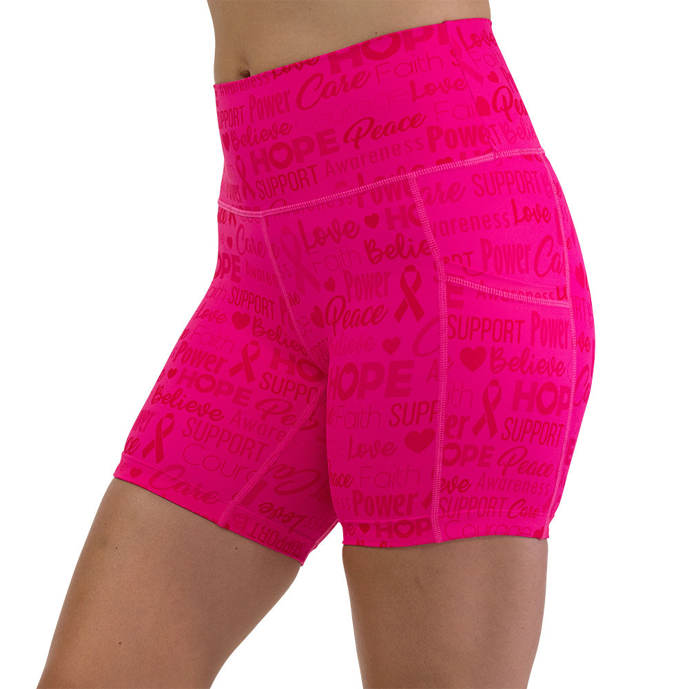 Pink shorts with motivational text and breast cancer awareness ribbons