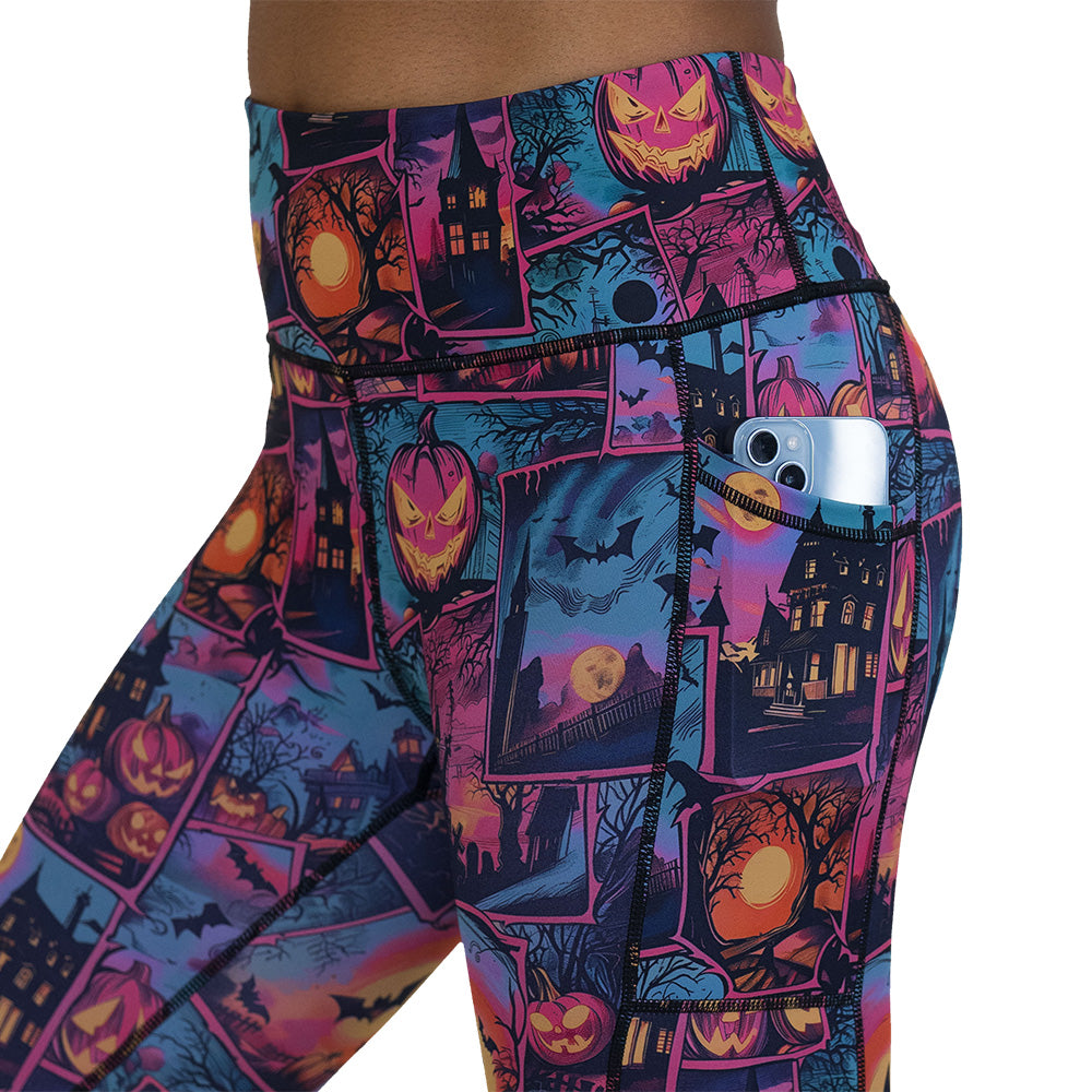 colorful Halloween-themed leggings with pumpkins, ghosts, and bats