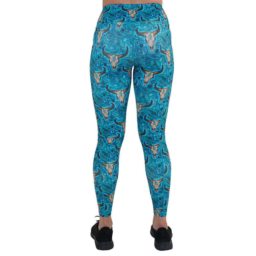 back of the teal cow skull print leggings